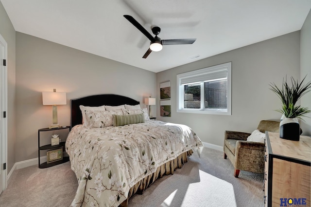8947 Himark Ln, Lincoln, NE 68526 - bedroom featuring light colored carpet, baseboards, and ceiling fan