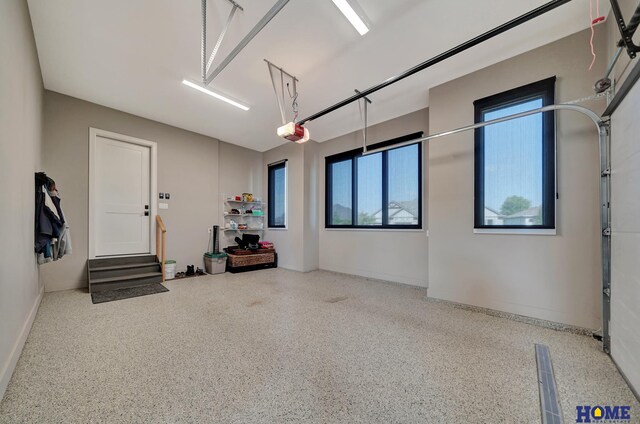 8947 Himark Ln, Lincoln, NE 68526 - garage with a garage door opener and baseboards