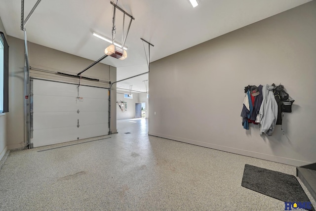 8947 Himark Ln, Lincoln, NE 68526 - garage with baseboards and a garage door opener