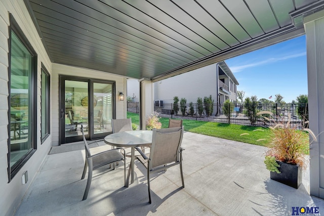 8947 Himark Ln, Lincoln, NE 68526 - view of patio with outdoor dining area and fence
