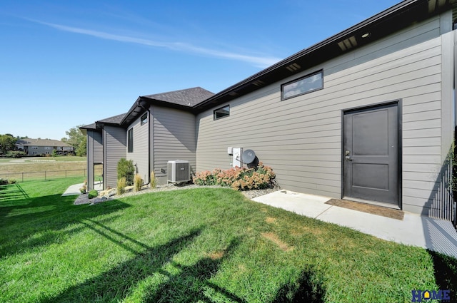 8947 Himark Ln, Lincoln, NE 68526 - rear view of property with central AC unit