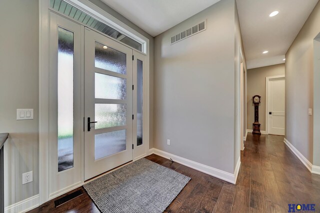 8947 Himark Ln, Lincoln, NE 68526 - entrance foyer with dark wood-style floors, baseboards, and recessed lighting