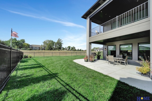 8947 Himark Ln, Lincoln, NE 68526 - view of yard featuring a balcony and a patio area