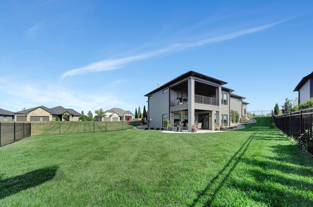 8947 Himark Ln, Lincoln, NE 68526 - back of property with a balcony and a patio area