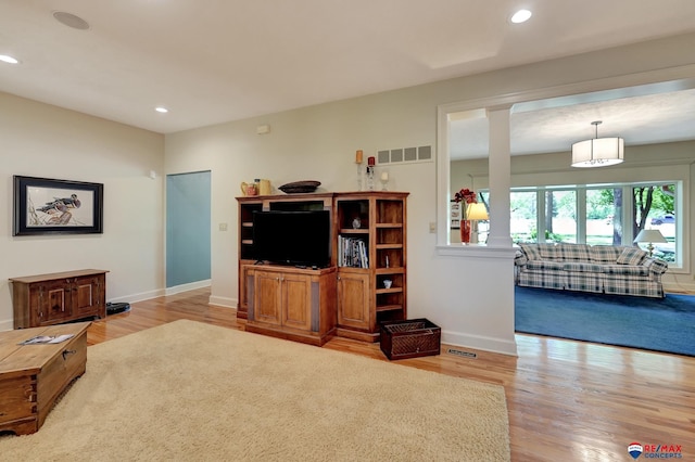 9900 Van Dorn St, Lincoln, NE 68520 - living area featuring wood finished floors, baseboards, and recessed lighting