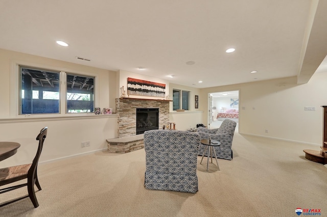 9900 Van Dorn St, Lincoln, NE 68520 - living room featuring light colored carpet, baseboards, a fireplace, and recessed lighting