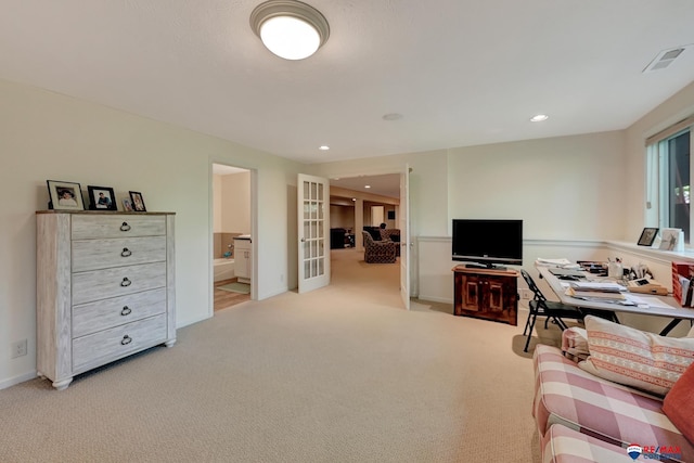 9900 Van Dorn St, Lincoln, NE 68520 - living room with light carpet, recessed lighting, french doors, and baseboards