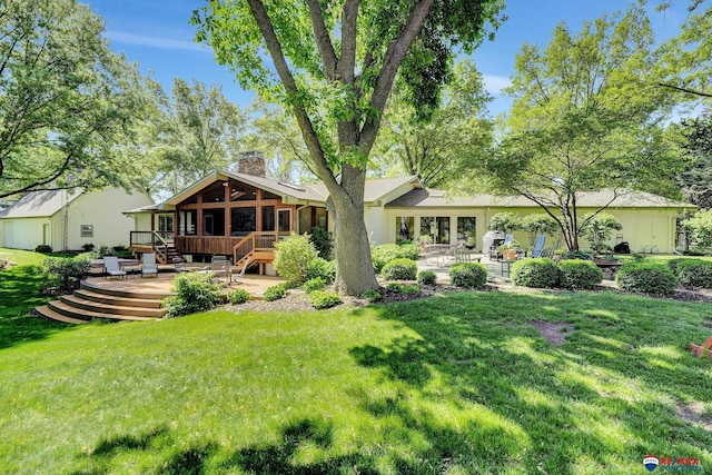 9900 Van Dorn St, Lincoln, NE 68520 - rear view of property with a deck, a chimney, a yard, and a patio area