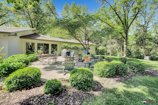 9900 Van Dorn St, Lincoln, NE 68520 - view of yard featuring a patio