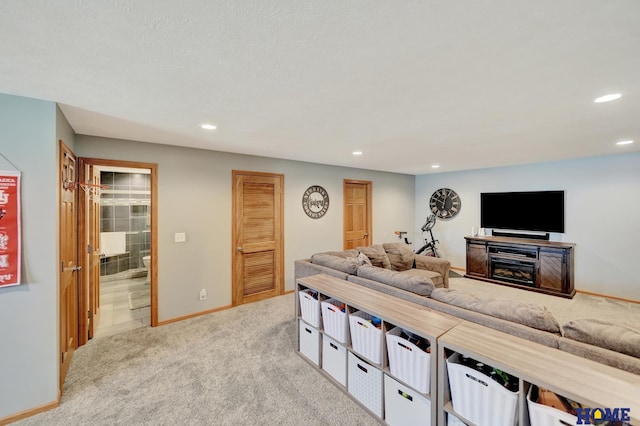 2222 SW Soukup Dr, Lincoln, NE 68522 - living room featuring carpet floors, recessed lighting, and baseboards