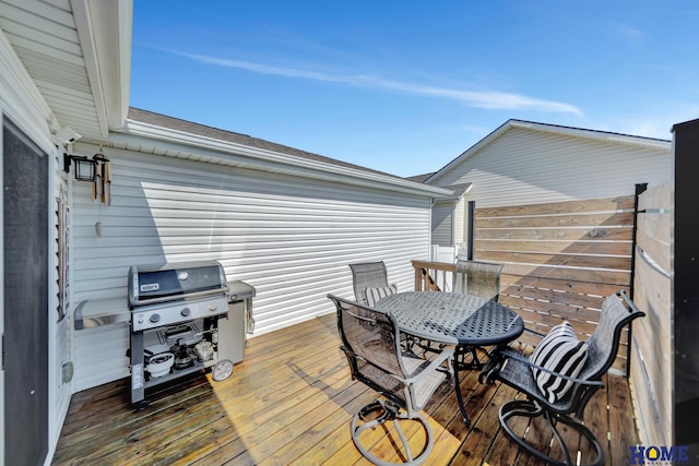 2222 SW Soukup Dr, Lincoln, NE 68522 - deck featuring outdoor dining area and area for grilling