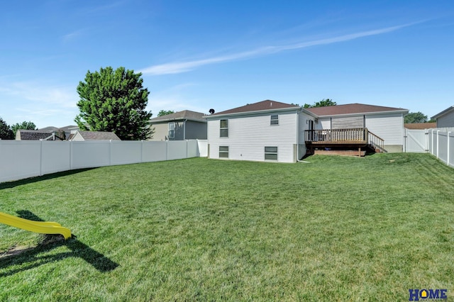 2222 SW Soukup Dr, Lincoln, NE 68522 - view of yard with a deck and a gate