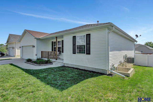 2222 SW Soukup Dr, Lincoln, NE 68522 - view of front facade featuring a porch, an attached garage, and cooling unit