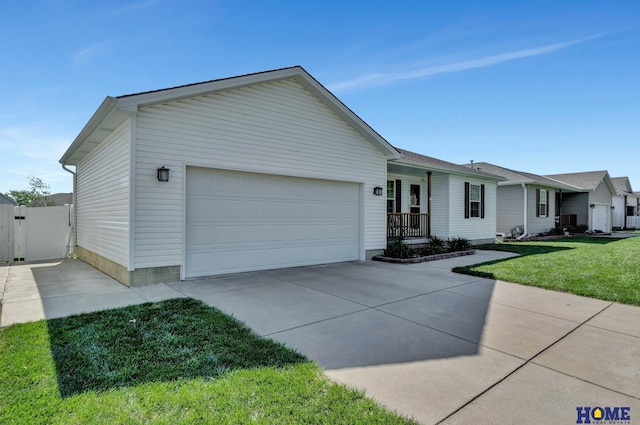 2222 SW Soukup Dr, Lincoln, NE 68522 - ranch-style home with an attached garage, driveway, and a gate