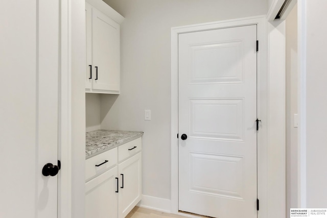 18108 Locust St, Elkhorn, NE 68022 - laundry area with baseboards
