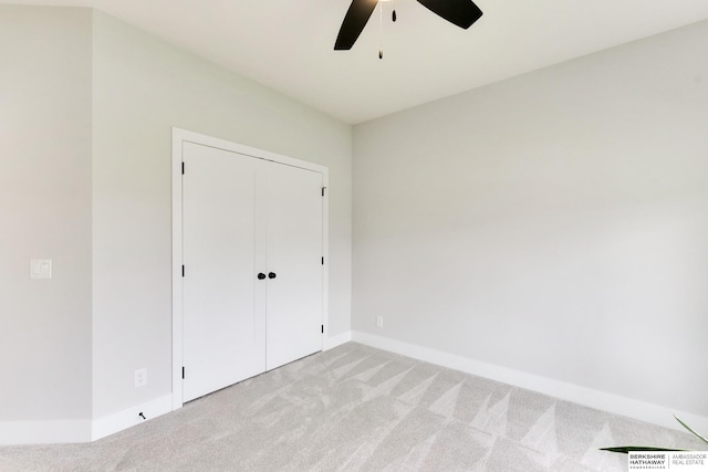 18108 Locust St, Elkhorn, NE 68022 - unfurnished bedroom with light carpet, baseboards, a closet, and a ceiling fan