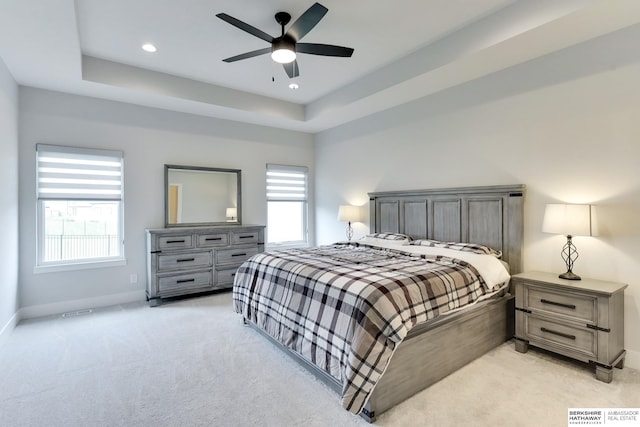 18108 Locust St, Elkhorn, NE 68022 - bedroom with light colored carpet, baseboards, a raised ceiling, ceiling fan, and recessed lighting