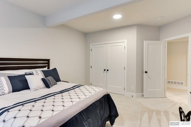 18108 Locust St, Elkhorn, NE 68022 - bedroom with light colored carpet, recessed lighting, a closet, beam ceiling, and baseboards