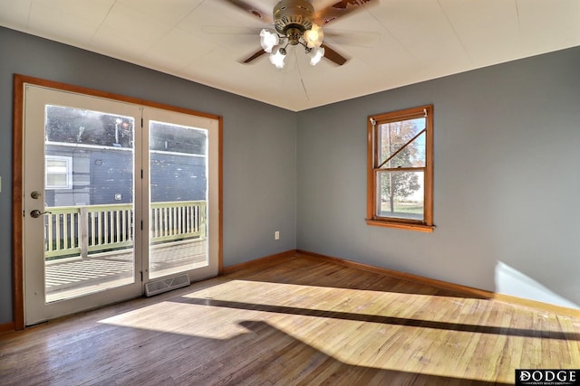 1807 N Platte Ave, Fremont, NE 68025 - empty room featuring wood finished floors, baseboards, and ceiling fan