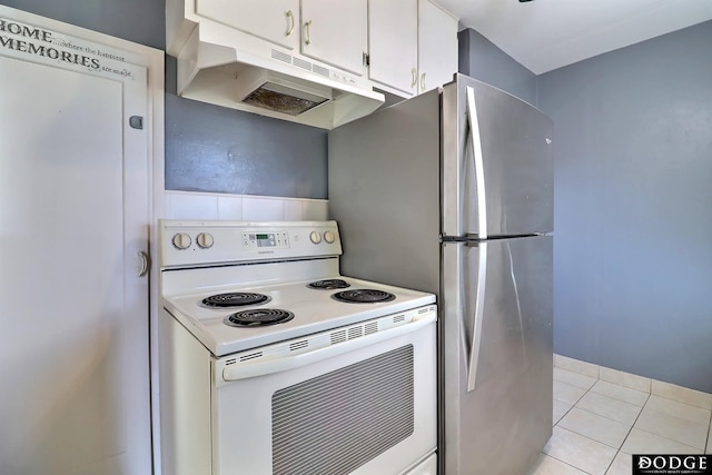 1807 N Platte Ave, Fremont, NE 68025 - kitchen with electric range, under cabinet range hood, white cabinets, and light tile patterned floors