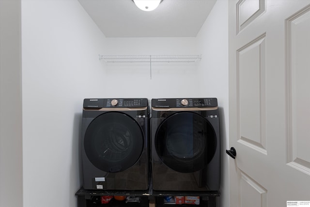 18652 Van Camp Dr, Omaha, NE 68130 - clothes washing area with washing machine and dryer