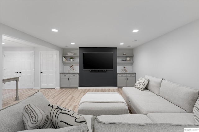 18652 Van Camp Dr, Omaha, NE 68130 - living room featuring light wood finished floors and recessed lighting