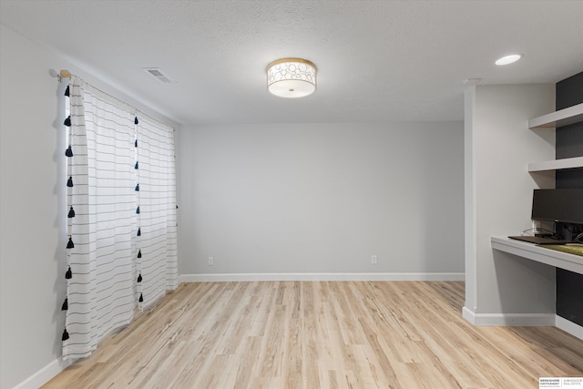 18652 Van Camp Dr, Omaha, NE 68130 - unfurnished dining area with light wood-style floors and baseboards