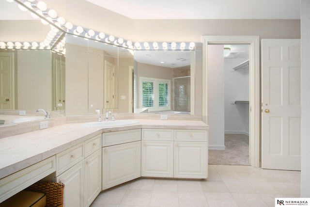 1125 Stone Creek Dr, Blair, NE 68008 - full bathroom featuring a shower stall, tile patterned floors, and vanity