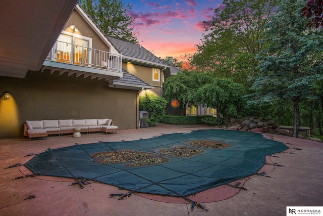 1125 Stone Creek Dr, Blair, NE 68008 - view of swimming pool with a patio area, a covered pool, and an outdoor hangout area