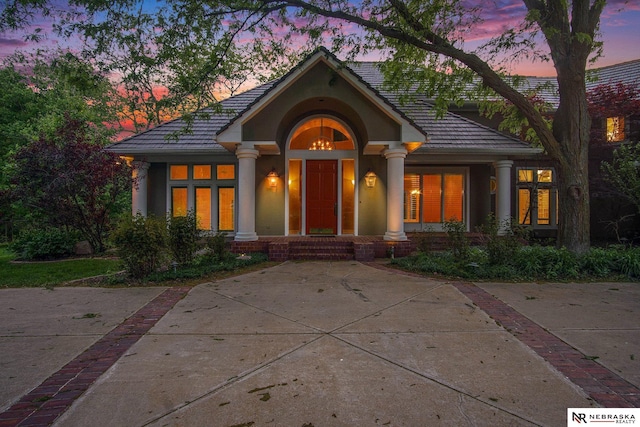 1125 Stone Creek Dr, Blair, NE 68008 - view of front of property featuring a tiled roof and stucco siding