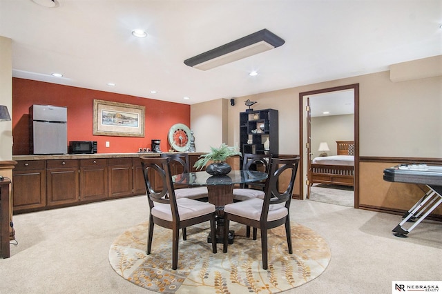 1125 Stone Creek Dr, Blair, NE 68008 - dining space featuring light colored carpet and recessed lighting