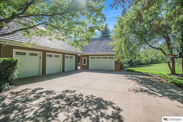1125 Stone Creek Dr, Blair, NE 68008 - garage featuring concrete driveway