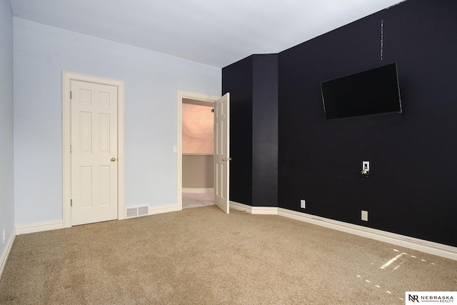 1125 Stone Creek Dr, Blair, NE 68008 - unfurnished bedroom featuring carpet floors and baseboards