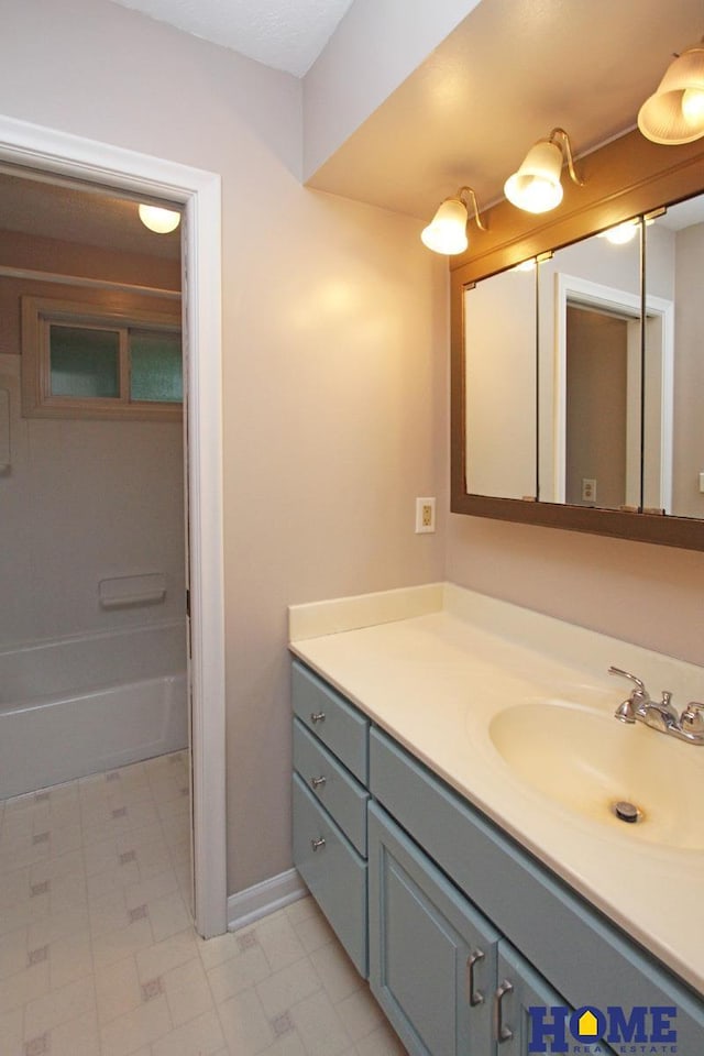 1701 N 73rd St, Lincoln, NE 68505 - full bath with vanity, shower / washtub combination, and tile patterned floors