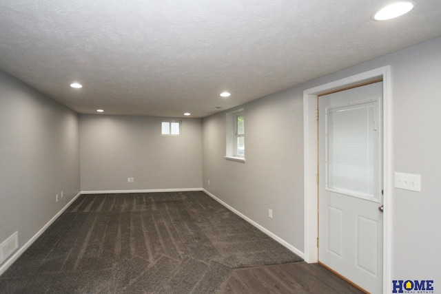 1701 N 73rd St, Lincoln, NE 68505 - below grade area with recessed lighting, baseboards, and wood finished floors