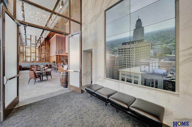 1125 Q St Unit 1401, Lincoln, NE 68508 - building lobby featuring a towering ceiling