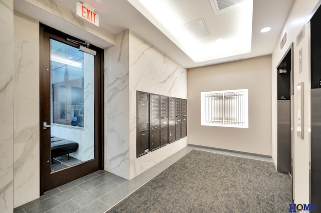 1125 Q St Unit 1401, Lincoln, NE 68508 - view of home's community featuring mail area and recessed lighting