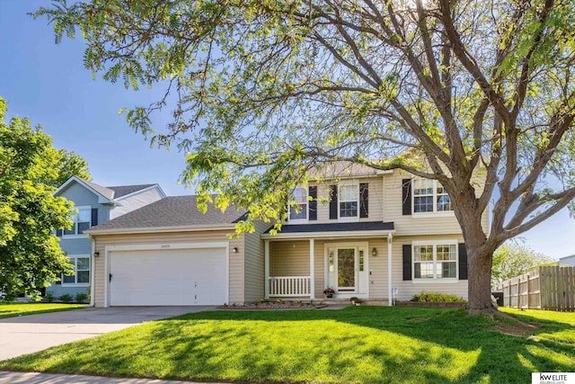 3909 N 147th St, Omaha, NE 68116 - traditional-style home with a garage, concrete driveway, and a porch