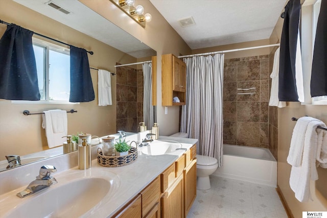3909 N 147th St, Omaha, NE 68116 - full bathroom with double vanity, shower / bathtub combination with curtain, toilet, and tile patterned floors