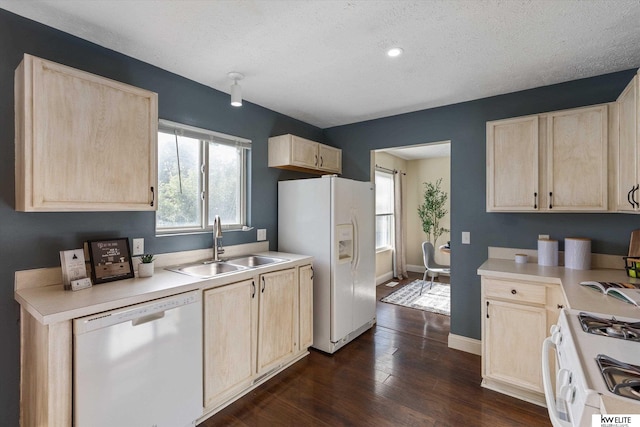 3909 N 147th St, Omaha, NE 68116 - kitchen featuring white appliances, light brown cabinets, a sink, a textured ceiling, and recessed lighting
