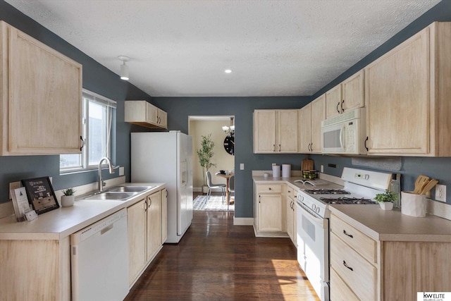 3909 N 147th St, Omaha, NE 68116 - kitchen with white appliances, light brown cabinetry, a sink, light countertops, and dark wood-style flooring