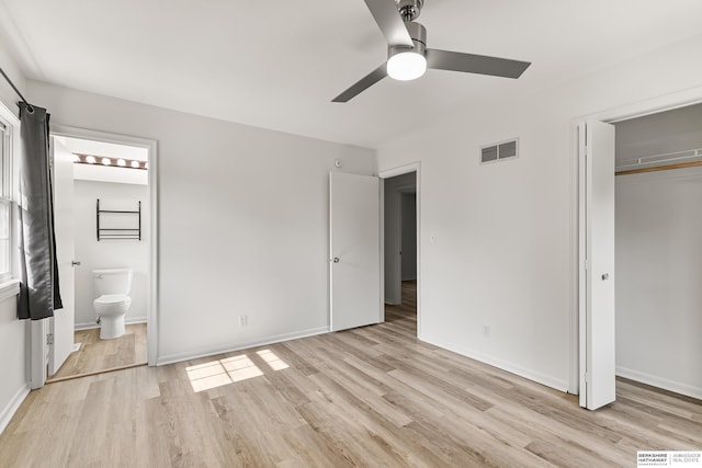 221 Lindale Cir, Hickman, NE 68372 - unfurnished bedroom with light wood finished floors, baseboards, and ensuite bath