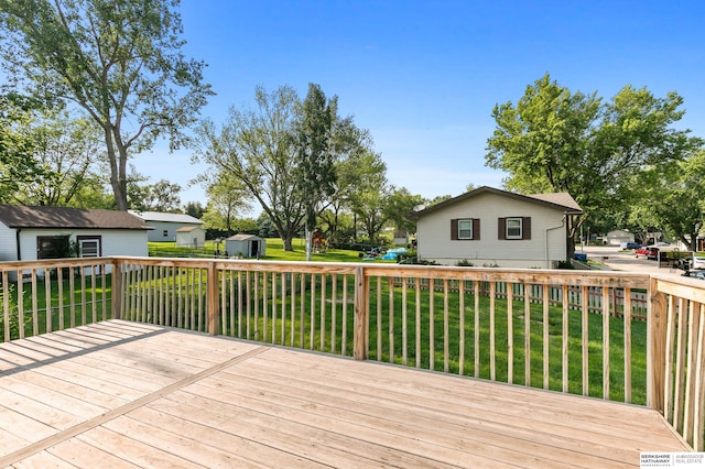 221 Lindale Cir, Hickman, NE 68372 - wooden deck with a yard