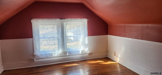 942 Manatt St, Lincoln, NE 68521 - bonus room featuring wood finished floors and vaulted ceiling