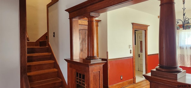 942 Manatt St, Lincoln, NE 68521 - staircase featuring wood finished floors and decorative columns