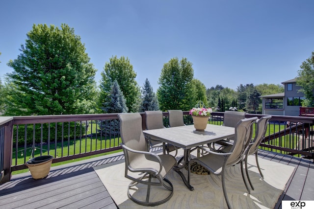 1411 S 195th St, Omaha, NE 68130 - wooden deck with outdoor dining space and a yard