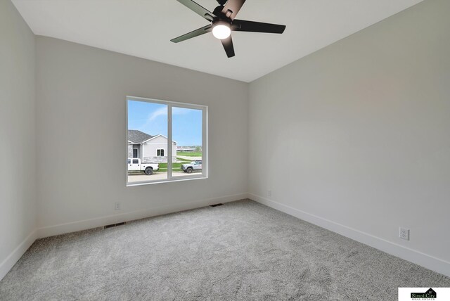 8600 S 50th Ct, Lincoln, NE 68516 - carpeted empty room with baseboards and a ceiling fan