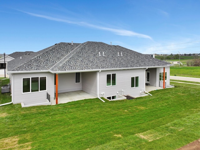 8600 S 50th Ct, Lincoln, NE 68516 - back of property with a patio, cooling unit, and a yard