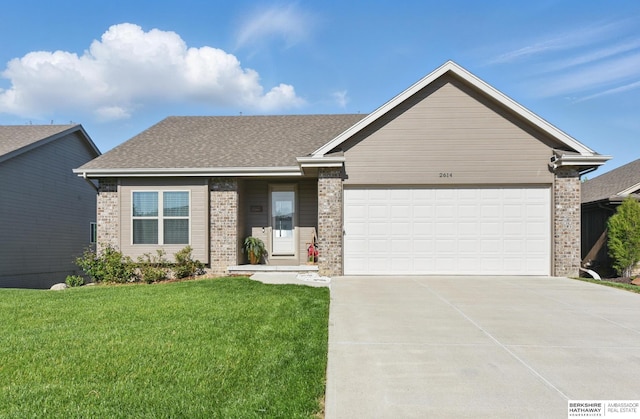 2614 N 191st Ave, Omaha, NE 68022 - view of front of house featuring brick siding, concrete driveway, an attached garage, and a front lawn