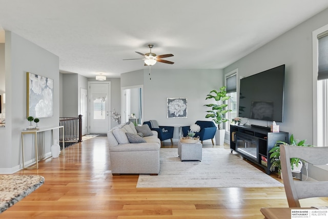 2614 N 191st Ave, Omaha, NE 68022 - living area featuring wood finished floors and a ceiling fan